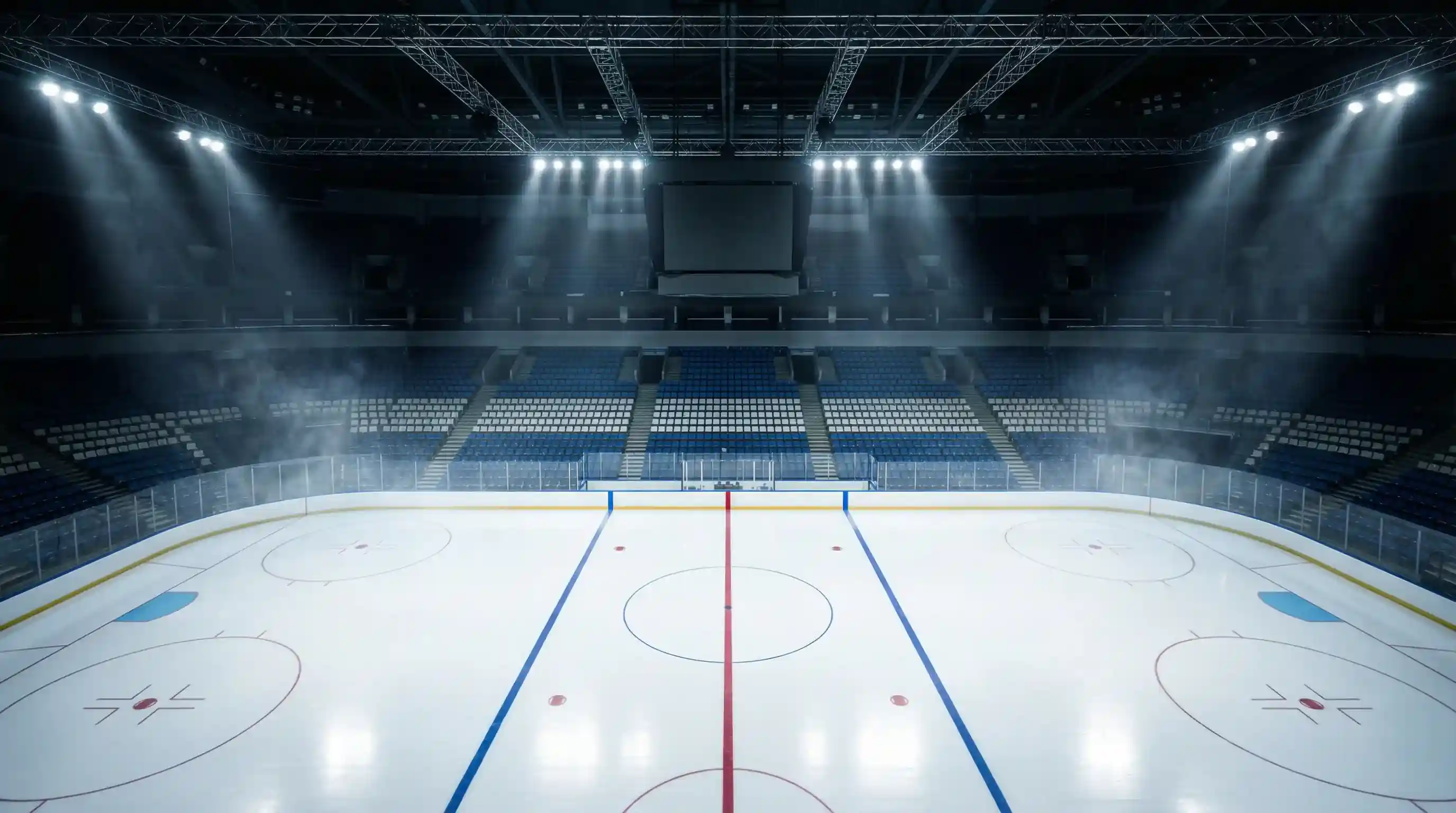 Estadio de hockey NHL con pista de hielo iluminada durante un partido profesional